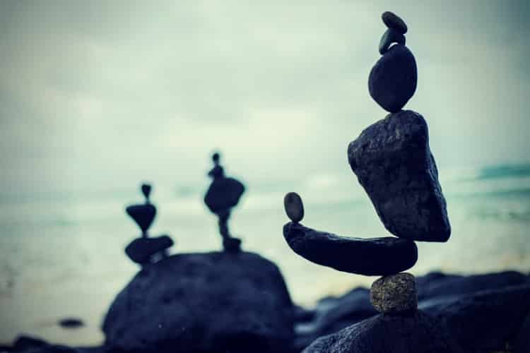 Closeup photography of stacked stones Closeup photography of stacked stones