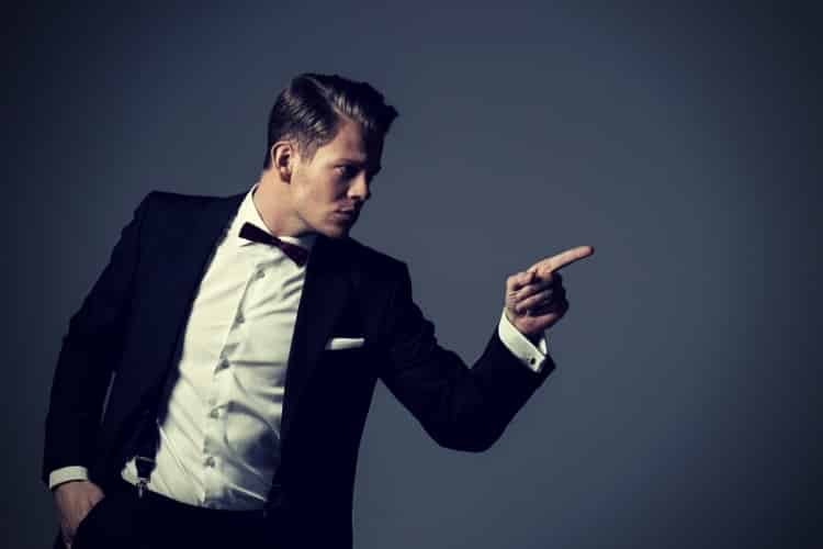 Confident sharp dressed man in black suit Confident sharp dressed man in black suit