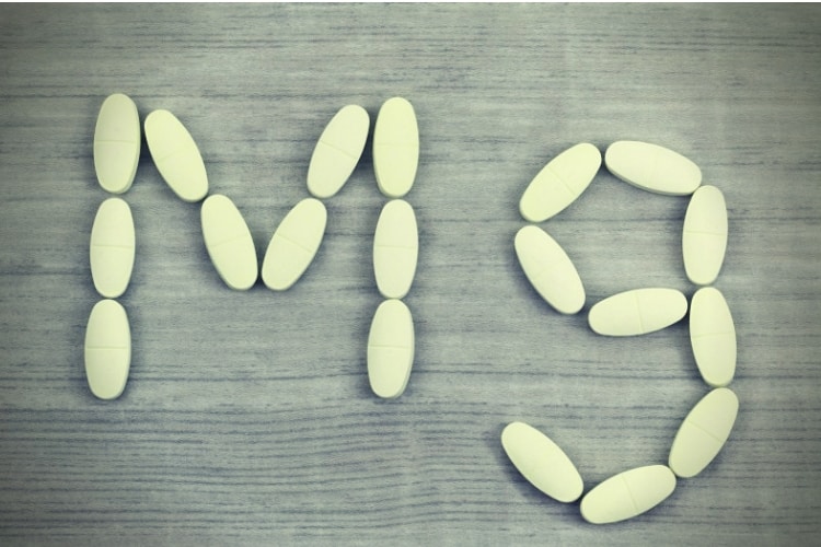 Magnesium tablets in a shape of Mg alphabet