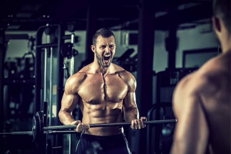 Man doing weight lifting in gym