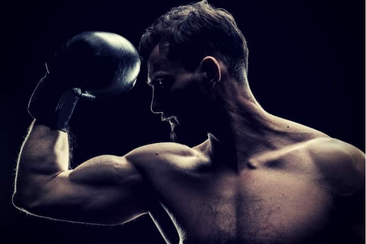 Sportsman in boxing glove best tribulus terrestris