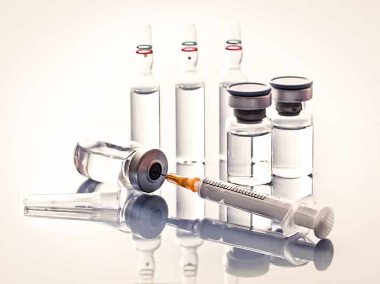 medicine vials and syringe